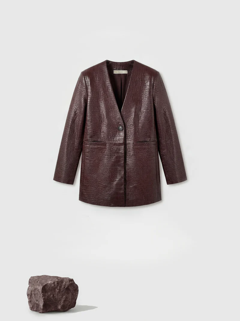 Brown leather outerwear application for premium metal zippers