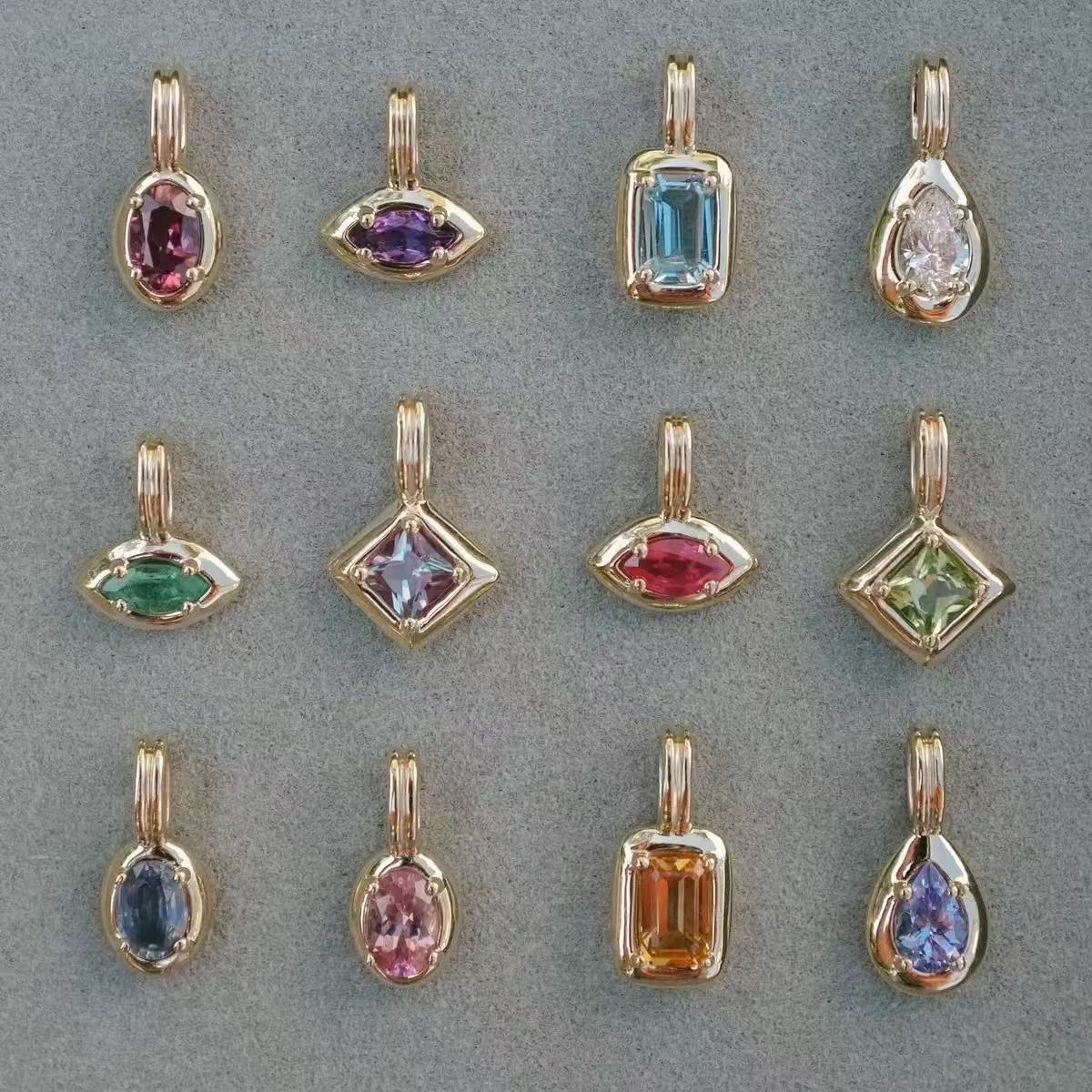 Colored faceted pieces in several shapes and surrounds.