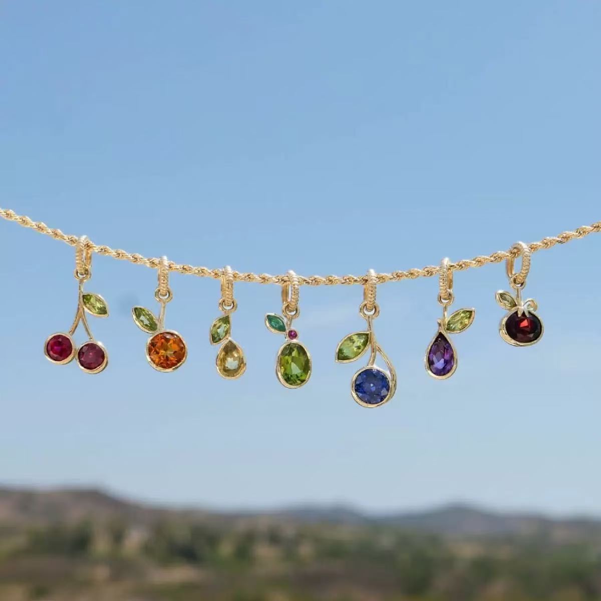 Small colorful motifs shown as a coordinated hanging assortment.